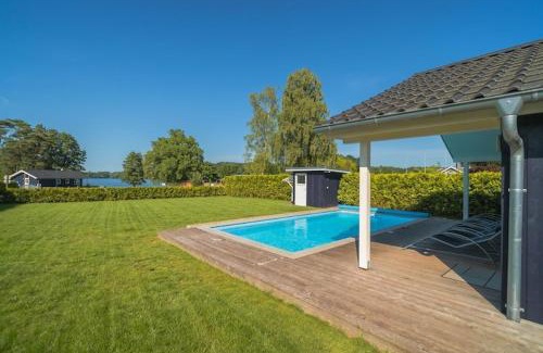 Dummer House | Ferienhaus mit Pool und Sauna am Duemmer See