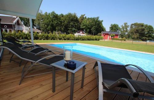 Dummer House | Ferienhaus mit Pool und Sauna am Duemmer See