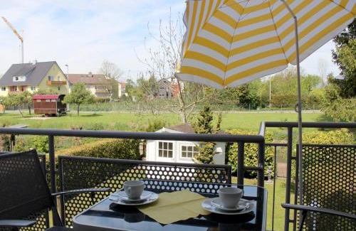 Langenargen Apartment | Ferienwohnung Am Mühlkanal - Schön gelegen mit Balkon und Blick ins Grüne