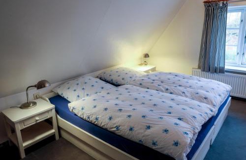 Utersum Apartment | Ferienwohnung die Scheune