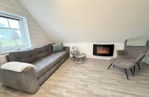Wiesmoor Apartment | Ferienwohnung Haus Moorblick Garten mit Terrasse Netflix E-Kamin Thermomix