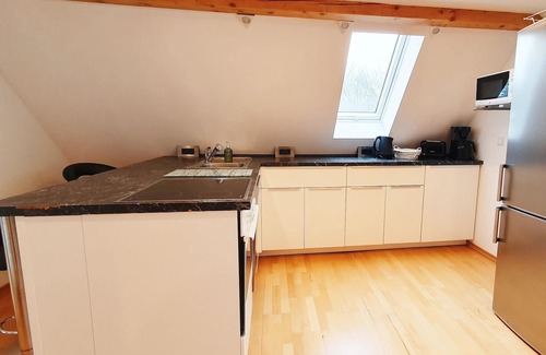 Traunstein Apartment | Ferienwohnung im Dachgeschoss, ca. 45m², für 2 Personen, Nichtraucher, Offener Wohnbereich