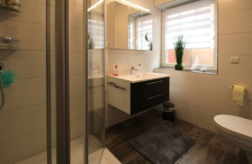 Neßmersiel Apartment | Ferienwohnung in Neßmersiel mit Garten und Feldblick