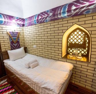 Itchan Kala Hotel | Feruzkhan Hotel - Madrassah Mohammed Rakhim Khan 1871
