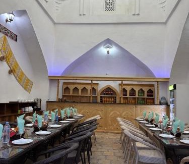 Itchan Kala Hotel | Feruzkhan Hotel - Madrassah Mohammed Rakhim Khan 1871
