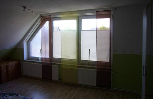 Neuharlingersiel Apartment | FEWO2 for families, also with a dog, view of the dike and a short walk to the beach