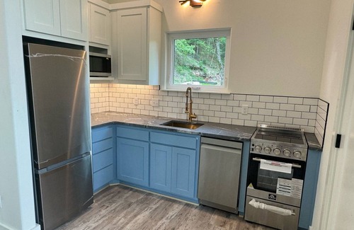 Sylvan Shores Cabin | Firefly1 - luxury treehouse, hot tub, lake access, ample parking, full kitchen