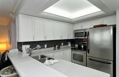 Siesta Key House | Firethorn 312 - 2 Bedroom Condo with Private Beach with lounge chairs & umbrella provided, 2 Pool.