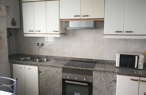 Poio Apartment | First floor apartment of 85 m² (85 sqm), 3 rooms with yard