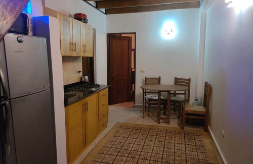 Bouvet Island Apartment | First-floor bedroom, Bathroom, kitchen.nSecond-floor bedroom, Living room and TV