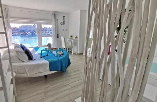 Santa Lucia Apartment | Flamingo SPA Loft by Picasa Sicilia - SEASIDE - SEA & ORTIGIA VIEW