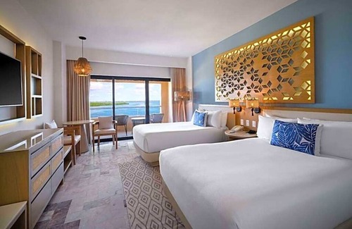 Punta Cancun Resort | Flexible Dual-Suite w/Balconies & Resort Perks – Wyndham Grand Cancun