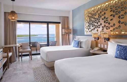 Punta Cancun Resort | Flexible Dual-Suite w/Balconies & Resort Perks – Wyndham Grand Cancun