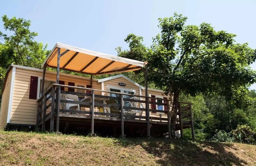 Les Ollieres-sur-Eyrieux House | Flower Camping Mas de Champel * - Mobile-Home 30m2 - Comfort - 2 bedrooms - Terrace semi-covered - TV - Clim 5 persons