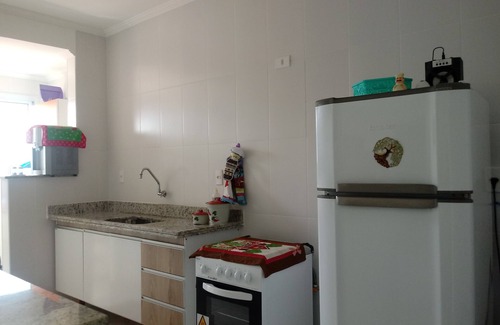 Caicara Apartment | Foot in the sand at Praia Grande