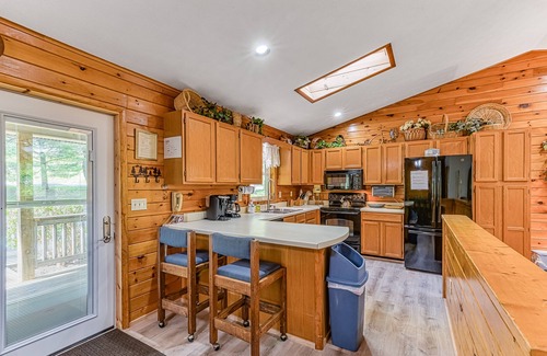 McHenry House | Forest View Home with Wrap-Around Deck - Minutes to the Lake & Wisp Resort