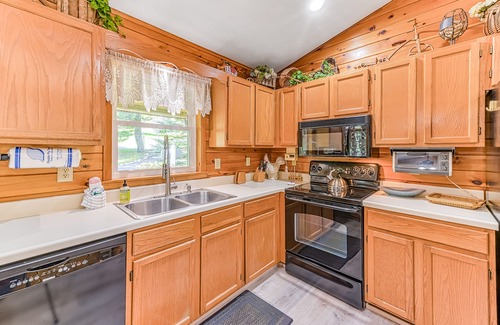 McHenry House | Forest View Home with Wrap-Around Deck - Minutes to the Lake & Wisp Resort