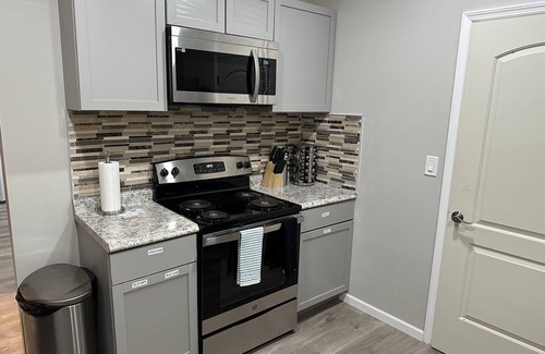 Hamilton House | Forget your worries in this spacious and serene space.