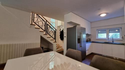 Zagreb Apartment | Forrest-Hugging Townhouse with Private Garden