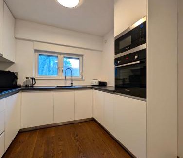 Zagreb Apartment | Forrest-Hugging Townhouse with Private Garden