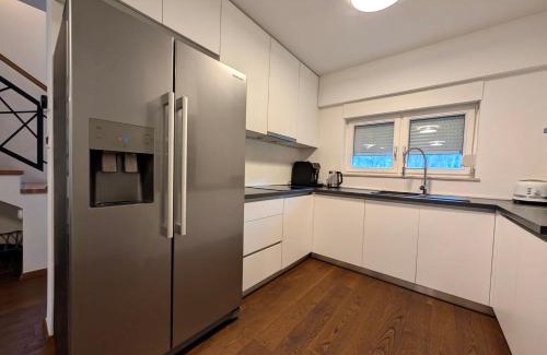 Zagreb Apartment | Forrest-Hugging Townhouse with Private Garden