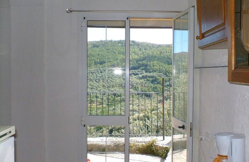Villa Viani Apartment | Four - Miguel Apartment with panoramic view, among olive trees, sea 15 km away