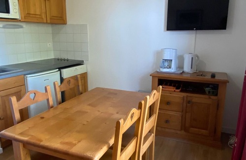 Besse-et-Saint-Anastaise Apartment | Apartment with terrace and pool near nature in Super-Besse