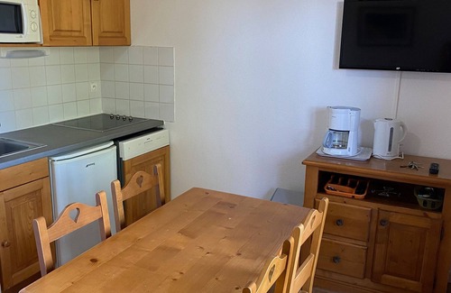 Besse-et-Saint-Anastaise Apartment | Apartment with terrace and pool near nature in Super-Besse