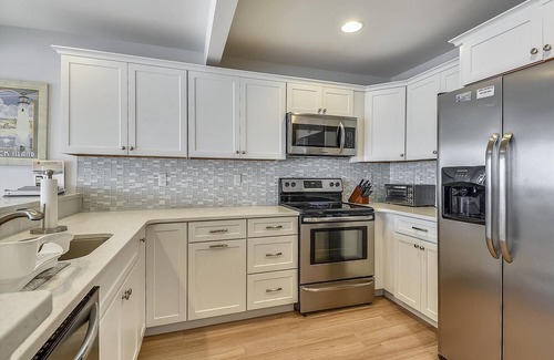 Fenwick Island Condo | Free Golf at Bear Trap Dunes and MORE! Amazing ocean front condo located just north of Fenwick Island State Park has been completely renovated for the 2017 summer season!