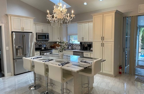 Golf and Sea Village of Apollo Beach House | Free heated pool at Apollo Beach gazebo grill pool table games