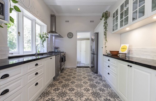 Claremont House | French Charm on Leafy Street near River.
