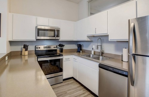 Mile Square Apartment | Frontdesk | 2 BR Apt by Kurt Vonnegut Library