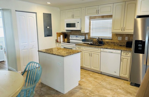 Naples House | Full 3-bedroom Canal Front home, in Goodland Fl