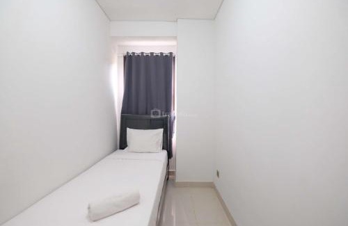 Depok Apartment | Fully Furnished and Cozy 2BR at Transpark Cibubur Apartment By Travelio