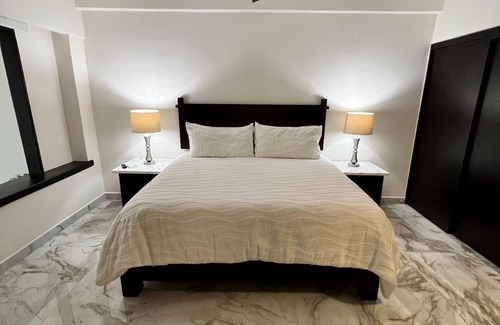 Flamingos Resort | Fully renovated top floor oceanfront condo.