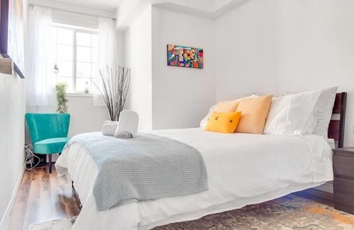 Beltline Apartment | Fun and Colourful Condo w Foosball Parking Coffee