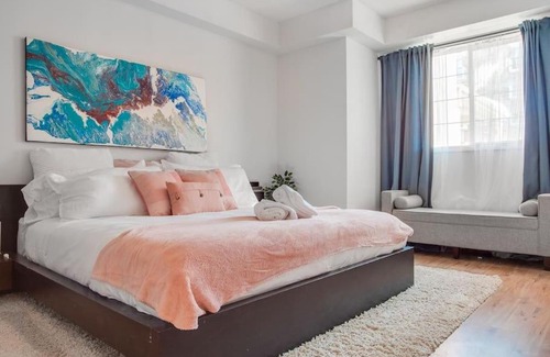 Beltline Apartment | Fun and Colourful Condo w Foosball Parking Coffee