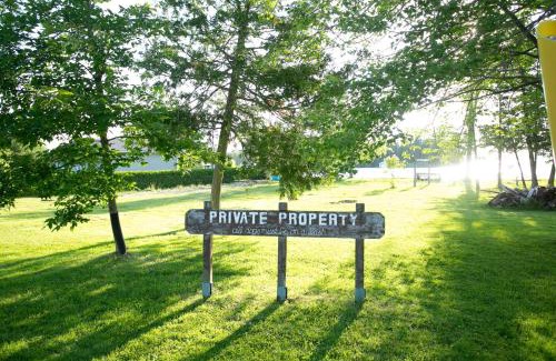 Lindsay House | Fun Place with a Sandy Beach for Swimming, Boating & Fishing, Featuring 1 House and 3 Cabins