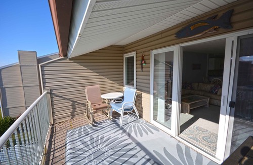 North Ocean City Condo | Fun, welcoming 2 bedroom condo with free WiFi, outdoor pool, and direct canal and bay view located midtown!