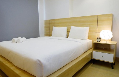 Pagedangan Apartment | Futuristic 1BR Casa De Parco Apartment near ICE BSD By Travelio