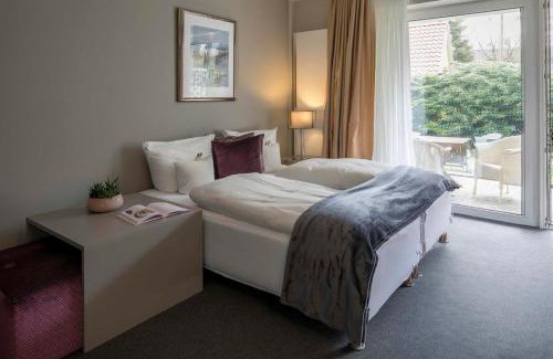 Spiekeroog Apartment | Gästehaus Orion - Wohnung 8
