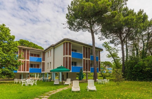 Bibione Pineda Apartment | Gabbiano tree-room flat surrounded by the green of the quite pine forest