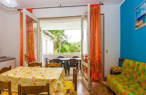 Bibione Pineda Apartment | Gabbiano tree-room flat surrounded by the green of the quite pine forest