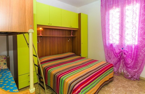 Bibione Pineda Apartment | Gabbiano tree-room flat surrounded by the green of the quite pine forest