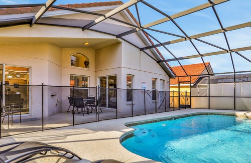 Solana House | Gated community home with game room, furnished lanai, pool, & AC - dog-friendly