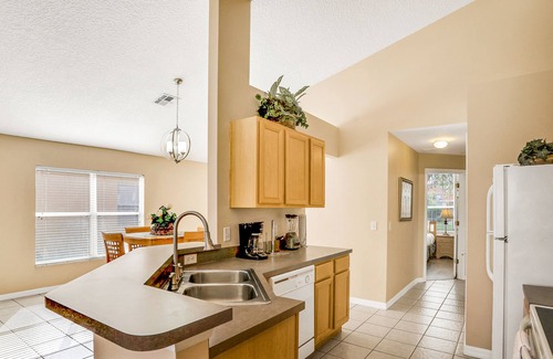 Solana House | Gated community home with game room, furnished lanai, pool, & AC - dog-friendly