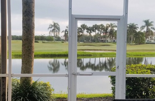 St. David's Island House | Gated Grand Harbor Townhome with beautiful views of the golf course and water
