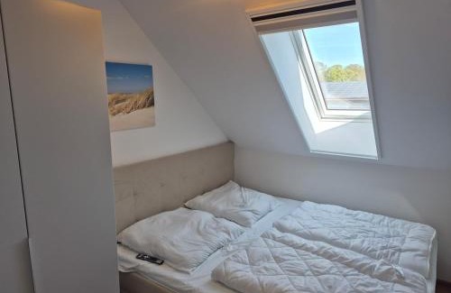 Dornum Apartment | Gemütliche FeWo 4-6 Personen in Traumlage mit Sauna