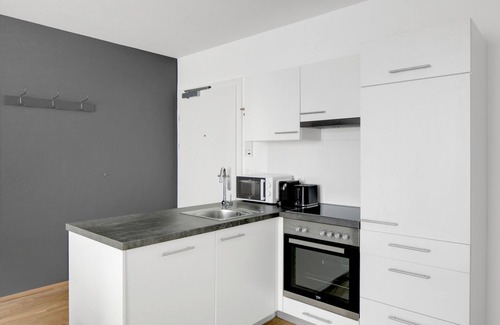 Kaisermuhlen Apartment | gepflegter Neubau mit Balkon, nähe UNO, Donauinsel und Alten Donau, viele Badestrände, 5 min zur U1