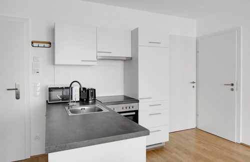Kaisermuhlen Apartment | gepflegter Neubau mit Balkon, nähe UNO, Donauinsel und Alten Donau, viele Badestrände, 5 min zur U1